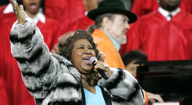 Aretha Franklin and Dr. John, background on piano, perform the national anthem before the Super Bowl XL football game in Detroit. Aretha Franklin