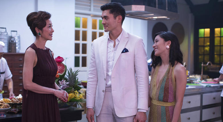 This image released by Warner Bros. Entertainment shows Michelle Yeoh, from left, Henry Golding and Constance Wu in a scene from the film "Crazy Rich Asians." "Crazy Rich Asians"