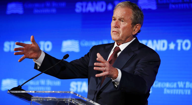 In this June 23, 2017 file photo, former President George W. Bush speaks during "Stand-To," a summit held by the George W. Bush Institute focused on veteran transition, in Washington. In this June 23, 2017 file photo, former President George W. Bush speaks during "Stand-To," a summit held by the George W. Bush Institute focused on veteran transition, in Washington.