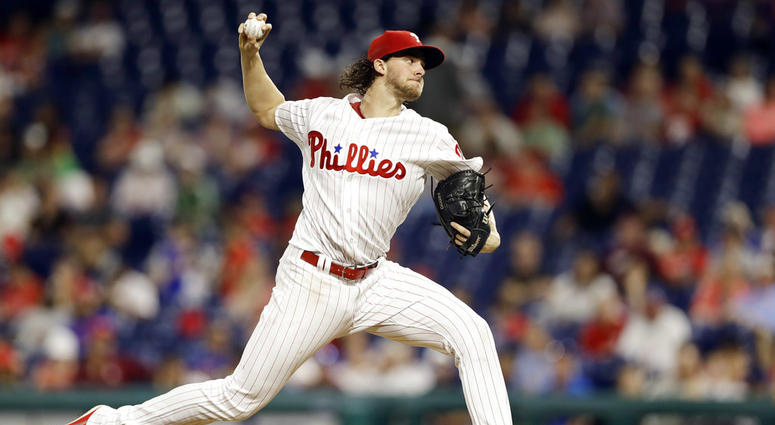 Philadelphia Phillies' Aaron Nola pitches during the second inning of the team's baseball game against the New York Mets, Tuesday, Sept. 18, 2018, in Philadelphia. Philadelphia Phillies' Aaron Nola