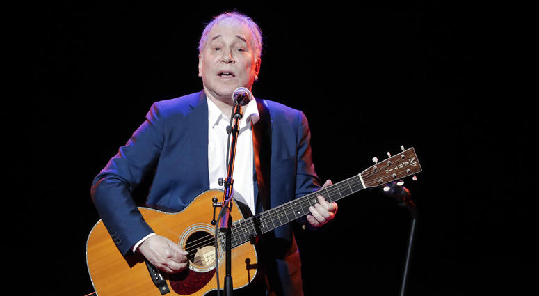 In a Sept. 22, 2016 file photo, musician Paul Simon performs during the Global Citizen Festival, in New York. Simon wraps up his farewell concert tour Saturday, Sept. 22, 2018 at a park in Queens, a bicycle ride across the borough from where he grew up.