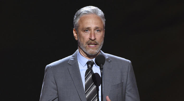 In this July 18, 2018, file photo on Stewart presents the Pat Tillman award for service at the ESPY Awards at Microsoft Theater in Los Angeles. Jon Stewart