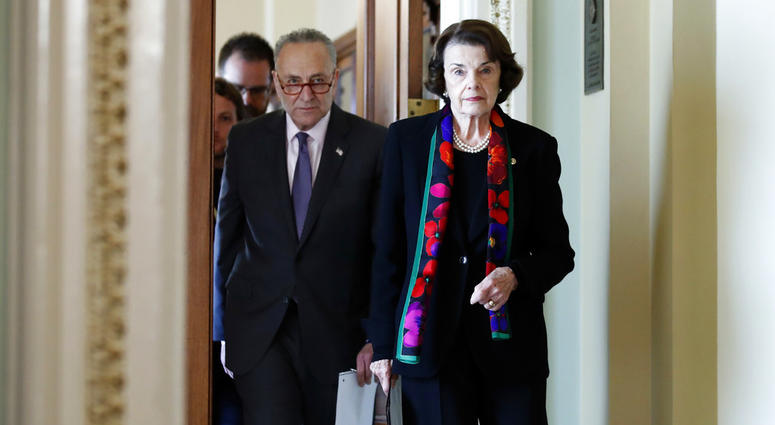 Senate Minority Leader Chuck Schumer, D-N.Y., left, and Senate Judiciary Committee Ranking Member Sen. Dianne Feinstein, D-Calif., arrive to speak to the media about the FBI report. Senate Minority Leader Chuck Schumer, D-N.Y., left, and Senate Judiciary Committee Ranking Member Sen. Dianne Feinstein, D-Calif., arrive to speak to the media about the FBI report.