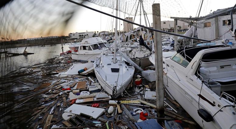 Damaged boats sit among debris in a marina in the aftermath of Hurricane Michael in Panama City, Fla., Friday, Oct. 12, 2018. Damaged boats sit among debris in a marina in the aftermath of Hurricane Michael in Panama City, Fla., Friday, Oct. 12, 2018.