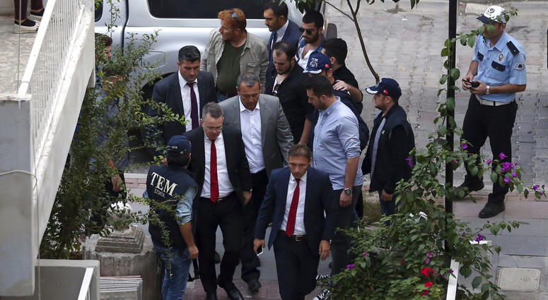 US Pastor Andrew Brunson, second left, arrives at home after his release, following his trial in Izmir, Turkey, Friday, Oct. 12, 2018. US Pastor Andrew Brunson, second left, arrives at home after his release, following his trial in Izmir, Turkey, Friday, Oct. 12, 2018.