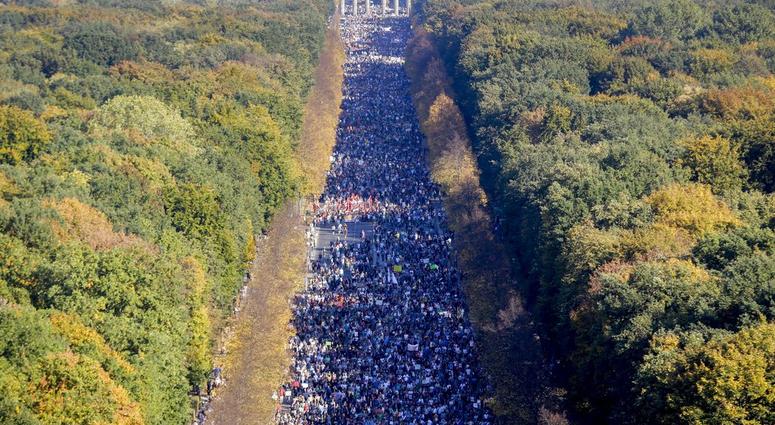 Thousands of people attend a demonstration with the slogan 'indivisible' against hate and four solidarity instead of exclusion in Berlin, Germany, Saturday, Oct. 13, 2018. Thousands of people attend a demonstration with the slogan 'indivisible' against hate and four solidarity instead of exclusion in Berlin, Germany, Saturday, Oct. 13, 2018.