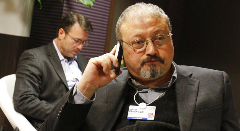 Saudi journalist Jamal Khashoggi speaks on his cellphone at the World Economic Forum in Davos, Switzerland. Jamal Khashoggi