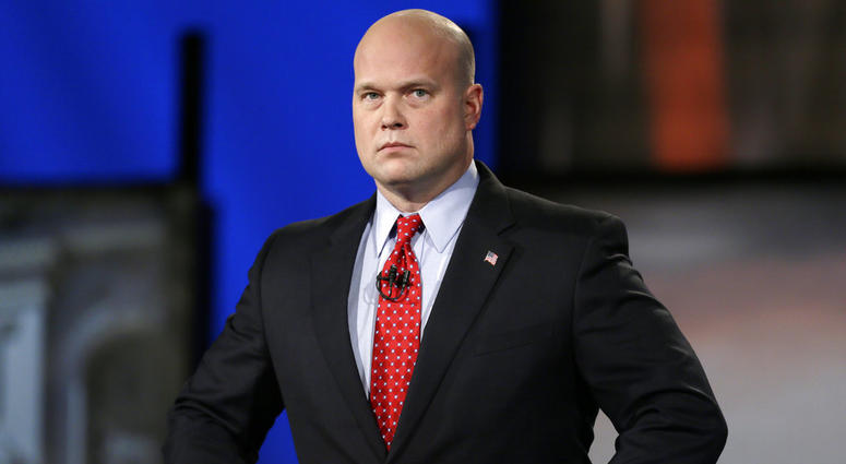 In this April 24, 2014, file photo, then-Iowa Republican senatorial candidate and former U.S. Attorney Matt Whitaker watches before a live televised debate in Johnston, Iowa. Matthew Whitaker