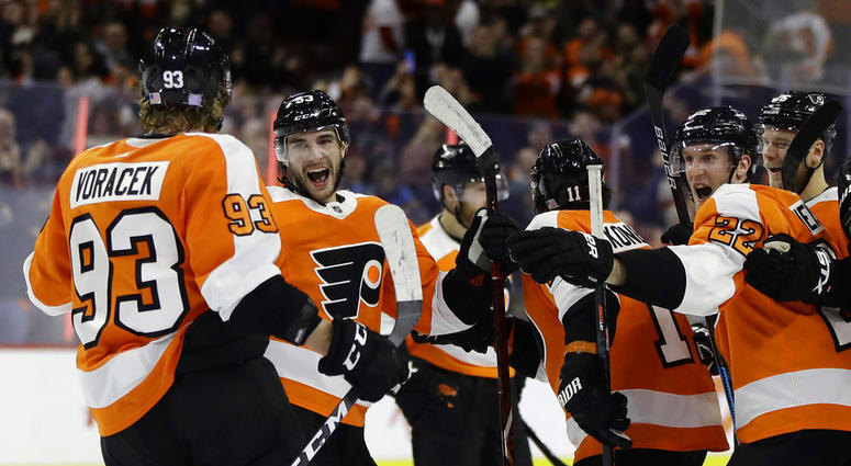 Flyers' Shayne Gostisbehere, second from left, celebrates with Jakub Voracek and teammates after scoring the game-winning goal in OT against the Coyotes. Flyers / Shayne Gostisbehere