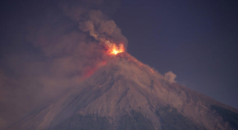 The Volcan de Fuego, or Volcano of Fire, spews hot molten lava and ash from its crater in Escuintla, Guatemala, early Monday, Nov. 19, 2018. The Volcan de Fuego, or Volcano of Fire, spews hot molten lava and ash from its crater in Escuintla, Guatemala, early Monday, Nov. 19, 2018.