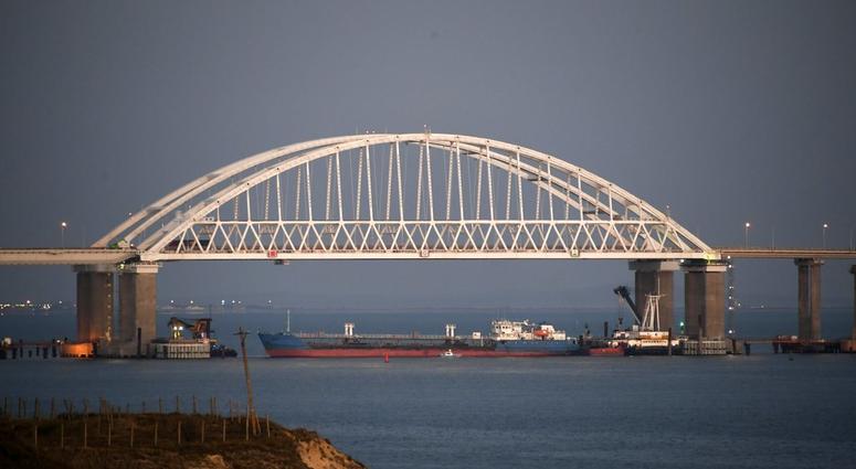 The Kerch bridge is seen blocked for ships entrance, near Kerch, Crimea, Sunday, Nov. 25, 2018. The Kerch bridge is seen blocked for ships entrance, near Kerch, Crimea, Sunday, Nov. 25, 2018.