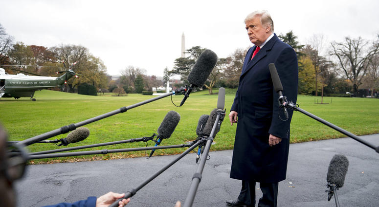 President Donald Trump listens to a question as he speaks to members of the media before boarding Marine One on the South Lawn of the White House in Washington, Monday, Nov. 26, 2018, for a short trip to Andrews Air Force Base, Md., and then on to Mississ President Donald Trump listens to a question as he speaks to members of the media before boarding Marine One on the South Lawn of the White House in Washington, Monday, Nov. 26, 2018, for a short trip to Andrews Air Force Base, Md., and then on to Mississ
