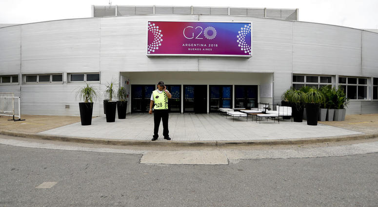 A security guard stands outside the G20 summit venue at the Costa Salguero Center, Buenos Aires, Argentina, Tuesday, Nov. 27, 2018. A security guard stands outside the G20 summit venue at the Costa Salguero Center, Buenos Aires, Argentina, Tuesday, Nov. 27, 2018.
