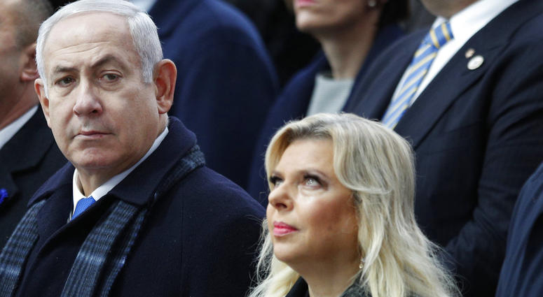 FILE - In this Nov. 11, 2018, file photo, Israeli Prime Minister Benjamin Netanyahu and his wife Sara attend ceremonies at the Arc de Triomphe in Paris. FILE - In this Nov. 11, 2018, file photo, Israeli Prime Minister Benjamin Netanyahu and his wife Sara attend ceremonies at the Arc de Triomphe in Paris.