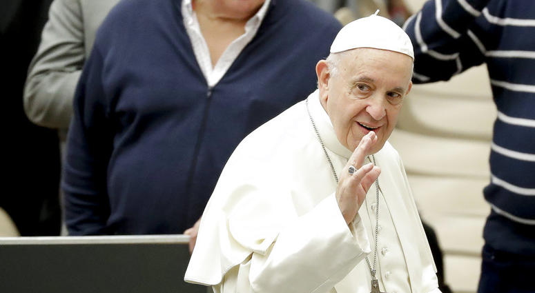 Pope Francis arrives for his weekly general audience, in the Pope Paul VI hall, at the Vatican, Wednesday, Dec. 5, 2018. Pope Francis