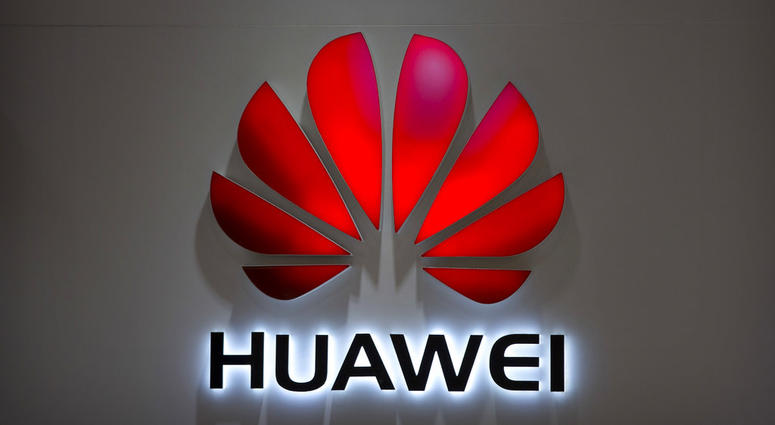 FILE - In this July 4, 2018, file photo, the Huawei logo is seen at a Huawei store at a shopping mall in Beijing. Canadian authorities said Wednesday, Dec. 5, 2018, that they have arrested the chief financial officer of China's Huawei Technologies for pos FILE - In this July 4, 2018, file photo, the Huawei logo is seen at a Huawei store at a shopping mall in Beijing. Canadian authorities said Wednesday, Dec. 5, 2018, that they have arrested the chief financial officer of China's Huawei Technologies for pos