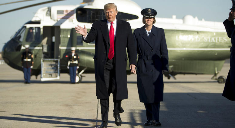 President Donald Trump walks to board Air Force One at Andrews Air Force Base, Md., Friday, Dec. 7, 2018, to travel to Kansas City, Mo., to speak at the 2018 Project Safe Neighborhoods National Conference. President Donald Trump
