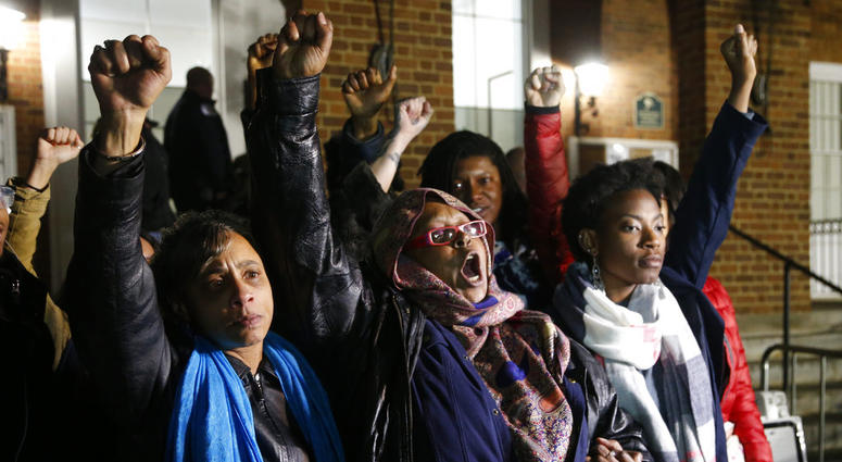 Local activists raise their fists outside Charlottesville General District Court after a guilty verdict was reached in the trial of James Alex Fields Jr., in Charlottesville, Va., Friday, Dec. 7, 2018. Local activists raise their fists outside Charlottesville General District Court after a guilty verdict was reached in the trial of James Alex Fields Jr., in Charlottesville, Va., Friday, Dec. 7, 2018.