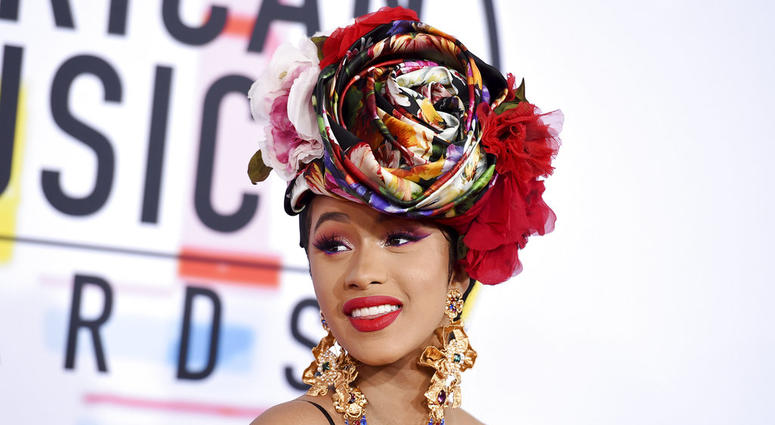 In this Oct. 9, 2018, file photo, Cardi B arrives at the American Music Awards, at the Microsoft Theater in Los Angeles. Cardi B