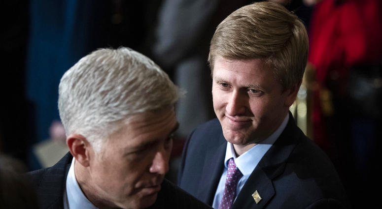 In a Monday, Dec. 3, 2018 file photo, Nick Ayers, right, listens as Supreme Court Associate Justice Neil Gorsuch waits for the arrival of the casket for former President George H.W. Bush to lie in State at the Capitol on Capitol Hill in Washington. In a Monday, Dec. 3, 2018 file photo, Nick Ayers, right, listens as Supreme Court Associate Justice Neil Gorsuch waits for the arrival of the casket for former President George H.W. Bush to lie in State at the Capitol on Capitol Hill in Washington.