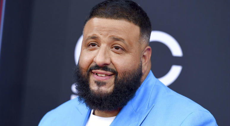 FILE - In this May 20, 2018 file photo, DJ Khaled arrives at the Billboard Music Awards in Las Vegas. Meek Mill, Busta Rhymes and Fat Joe were among the rappers that came out to celebrate DJ Khaled’s birthday at an over-the-top party at the Perez Art Muse FILE - In this May 20, 2018 file photo, DJ Khaled arrives at the Billboard Music Awards in Las Vegas. Meek Mill, Busta Rhymes and Fat Joe were among the rappers that came out to celebrate DJ Khaled’s birthday at an over-the-top party at the Perez Art Muse