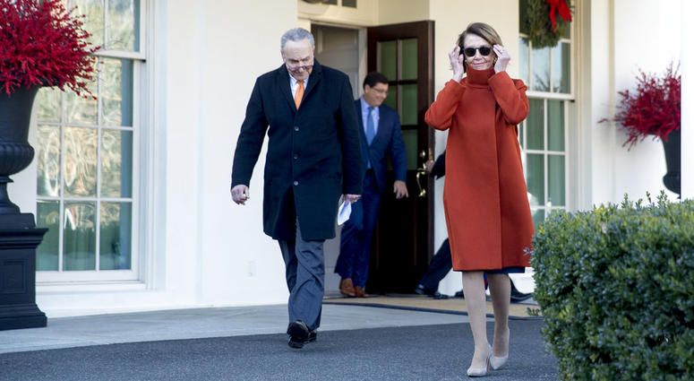 House Minority Leader Nancy Pelosi of Calif., right, and Senate Minority Leader Sen. Chuck Schumer of N.Y., left, walk out of the West Wing to speak to members of the media outside of the White House, Dec. 11, 2018. House Minority Leader Nancy Pelosi of Calif., right, and Senate Minority Leader Sen. Chuck Schumer of N.Y., left, walk out of the West Wing to speak to members of the media outside of the White House, Dec. 11, 2018.