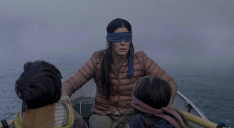 FILE- This file image released by Netflix shows Sandra Bullock in a scene from the film, "Bird Box." FILE- This file image released by Netflix shows Sandra Bullock in a scene from the film, "Bird Box."