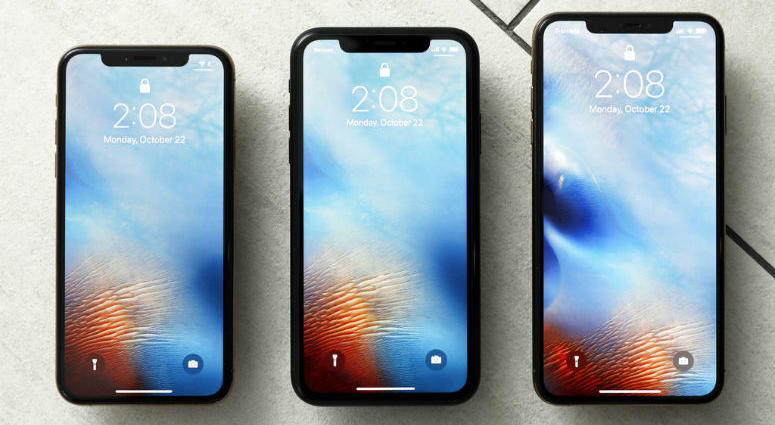 FILE - This Oct. 22, 2018, file photo shows the iPhone XS, from left, iPhone XR, and the iPhone XS Max in New York. FILE - This Oct. 22, 2018, file photo shows the iPhone XS, from left, iPhone XR, and the iPhone XS Max in New York.