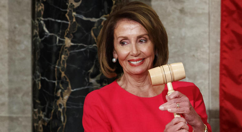 House Speaker Nancy Pelosi of California holds the gavel after at the Capitol in Washington, Thursday, Jan. 3, 2019. House Speaker Nancy Pelosi