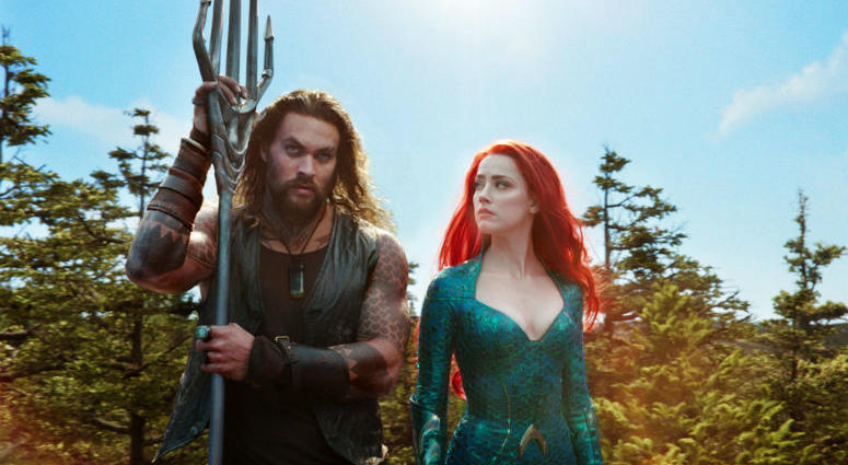This image released by Warner Bros. Pictures shows Jason Momoa, left, and Amber Heard in a scene from "Aquaman." This image released by Warner Bros. Pictures shows Jason Momoa, left, and Amber Heard in a scene from "Aquaman."