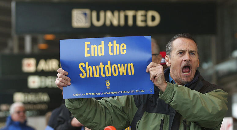 Several dozen federal employees and supporters demonstrated at the Sacramento International Airport calling for President Donald Trump and Washington lawmakers to end then partial government shutdown, Wednesday, Jan. 16, 2019, in Sacramento, Calif. Several dozen federal employees and supporters demonstrated at the Sacramento International Airport calling for President Donald Trump and Washington lawmakers to end then partial government shutdown, Wednesday, Jan. 16, 2019, in Sacramento, Calif.
