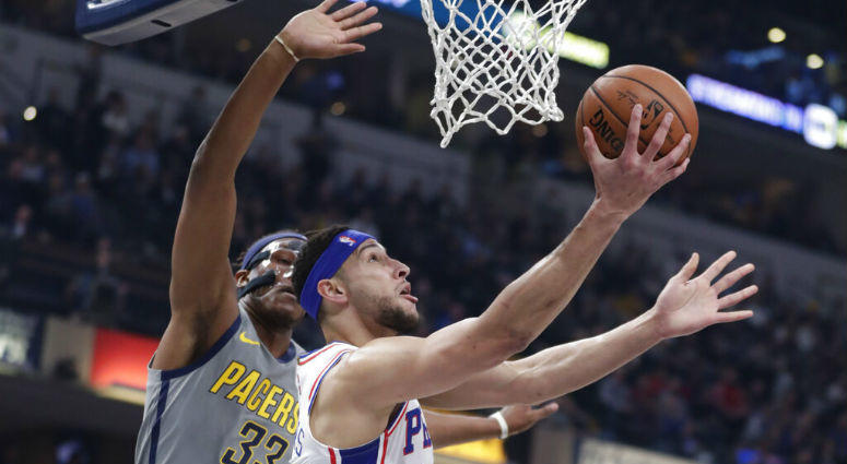 Philadelphia 76ers guard Ben Simmons (25) shoots next to Indiana Pacers center Myles Turner (33) during the first half of an NBA basketball game in Indianapolis, Thursday, Jan. 17, 2019. Philadelphia 76ers guard Ben Simmons (25) shoots next to Indiana Pacers center Myles Turner (33) during the first half of an NBA basketball game in Indianapolis, Thursday, Jan. 17, 2019.