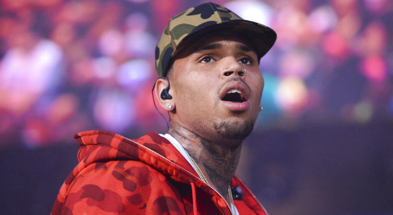 FILE - In this June 7, 2015 file photo, rapper Chris Brown performs at the 2015 Hot 97 Summer Jam at MetLife Stadium in East Rutherford, N.J. FILE - In this June 7, 2015 file photo, rapper Chris Brown performs at the 2015 Hot 97 Summer Jam at MetLife Stadium in East Rutherford, N.J.