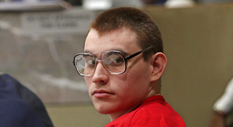 In this Jan. 16, 2019 file photo, Parkland school shooting suspect Nikolas Cruz sits during a status hearing at the Broward Courthouse in Fort Lauderdale, Fla. In this Jan. 16, 2019 file photo, Parkland school shooting suspect Nikolas Cruz sits during a status hearing at the Broward Courthouse in Fort Lauderdale, Fla.