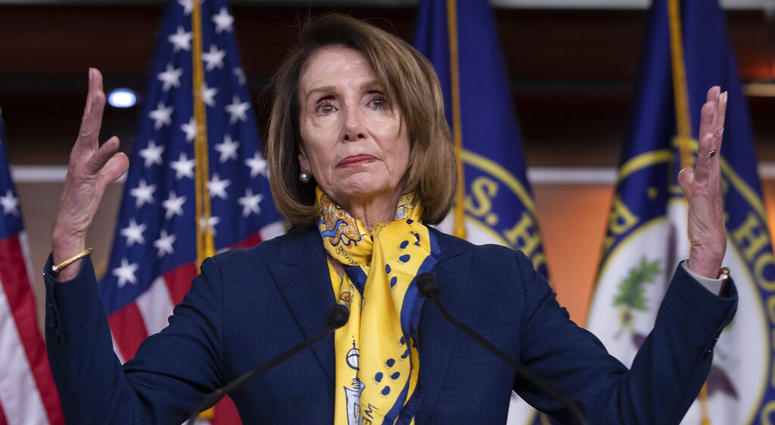 Speaker of the House Nancy Pelosi, D-Calif., talks to reporters a day after officially postponing President Donald Trump's State of the Union address until the government is fully reopened, at the Capitol in Washington, Thursday, Jan. 24, 2019. Speaker of the House Nancy Pelosi