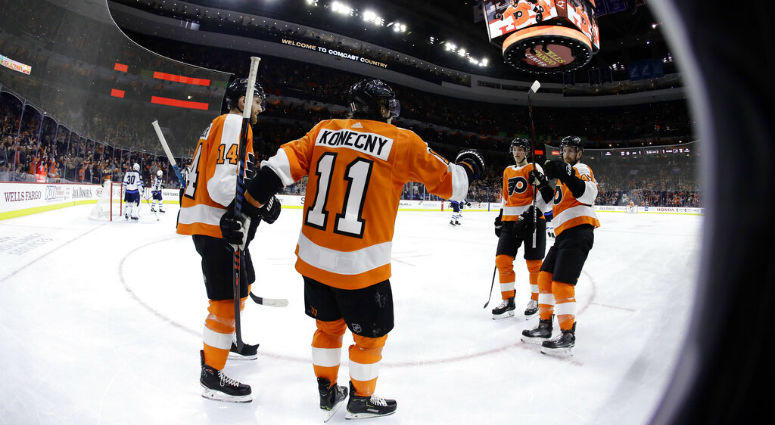 Philadelphia Flyers' Travis Konecny (11) celebrates with Sean Couturier (14) , Andrew MacDonald (47) and Travis Sanheim (6) after scoring a goal during the second period of an NHL hockey game against the Winnipeg Jets, Monday, Jan. 28, 2019, in Philadelph Philadelphia Flyers' Travis Konecny (11) celebrates with Sean Couturier (14) , Andrew MacDonald (47) and Travis Sanheim (6) after scoring a goal during the second period of an NHL hockey game against the Winnipeg Jets, Monday, Jan. 28, 2019, in Philadelph