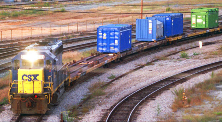 FILE - In this Sept. 29, 1994 file photo, a CSX Train with spent nuclear fuel passes through Florence, S.C., on its way to Savannah River Site Weapons Complex near Aiken S.C. FILE - In this Sept. 29, 1994 file photo, a CSX Train with spent nuclear fuel passes through Florence, S.C., on its way to Savannah River Site Weapons Complex near Aiken S.C.