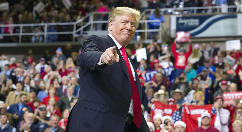 In this Nov. 26, 2018, file photo, President Donald Trump points to a supporter as he departs a rally at the Mississippi Coast Coliseum in Biloxi, Miss. In this Nov. 26, 2018, file photo, President Donald Trump points to a supporter as he departs a rally at the Mississippi Coast Coliseum in Biloxi, Miss.