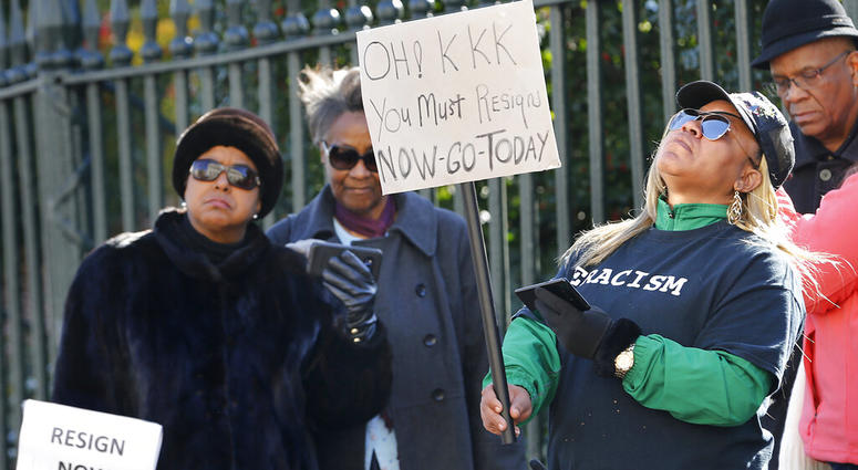 Tara Raigns, of Petersburg, Va., right, reacts to Gov. Ralph Northam's comments during a news conference in the Governor's Mansion in Richmond, Va., on Saturday, Feb. 2, 2019. Tara Raigns, of Petersburg, Va., right, reacts to Gov. Ralph Northam's comments during a news conference in the Governor's Mansion in Richmond, Va., on Saturday, Feb. 2, 2019.