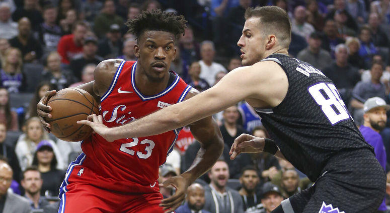 Philadelphia 76ers guard Jimmy Butler, left, drives to the basket against Sacramento Kings forward Nemanja Bjelica during the first quarter of an NBA basketball game Saturday, Feb. 2, 2019, in Sacramento, Calif. Philadelphia 76ers guard Jimmy Butler, left, drives to the basket against Sacramento Kings forward Nemanja Bjelica during the first quarter of an NBA basketball game Saturday, Feb. 2, 2019, in Sacramento, Calif.