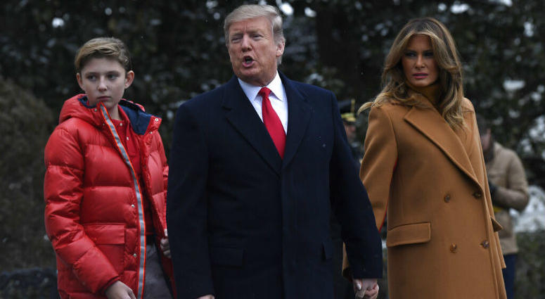 In this Feb. 1, 2019, photo, President Donald Trump, center, first lady Melania Trump, right, and their son Barron Trump, left, walk out of the White House and head to Marine One on the South Lawn of White House in Washington. In this Feb. 1, 2019, photo, President Donald Trump, center, first lady Melania Trump, right, and their son Barron Trump, left, walk out of the White House and head to Marine One on the South Lawn of White House in Washington.