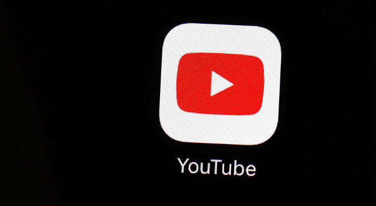 FILE - This March 20, 2018 file photo shows the YouTube app on an iPad in Baltimore. FILE - This March 20, 2018 file photo shows the YouTube app on an iPad in Baltimore.