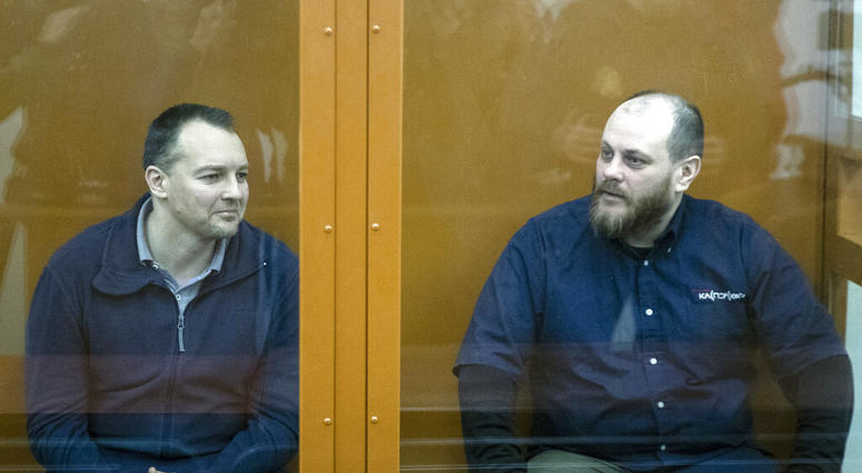 The former chief of the cybercrime department at Russia's main domestic security agency Sergei Mikhailov, left, and the former employee of Kaspersky Lab cybersecurity firm Ruslan Stoyanov attend a hearing in a court in Moscow, Russia, Tuesday, Feb. 26, 20 The former chief of the cybercrime department at Russia's main domestic security agency Sergei Mikhailov, left, and the former employee of Kaspersky Lab cybersecurity firm Ruslan Stoyanov attend a hearing in a court in Moscow, Russia, Tuesday, Feb. 26, 20