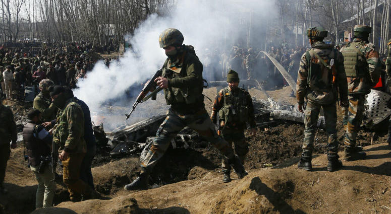 Indian army soldiers arrive at the wreckage of an an Indian helicopter after it crashed in Budgam area, outskirts of Srinagar, Indian controlled Kashmir, Wednesday, Feb.27, 2019. Indian army soldiers arrive at the wreckage of an an Indian helicopter after it crashed in Budgam area, outskirts of Srinagar, Indian controlled Kashmir, Wednesday, Feb.27, 2019.