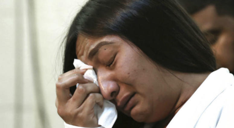 Salena Manni, the fiancee of Stephon Clark, who was shot and killed by Sacramento police in 2018, wipes tears from her eyes as she discusses the decision to not file charges against the two officers involved, during a news conference in Sacramento, Calif. Salena Manni, the fiancee of Stephon Clark, who was shot and killed by Sacramento police in 2018, wipes tears from her eyes as she discusses the decision to not file charges against the two officers involved, during a news conference in Sacramento, Calif.
