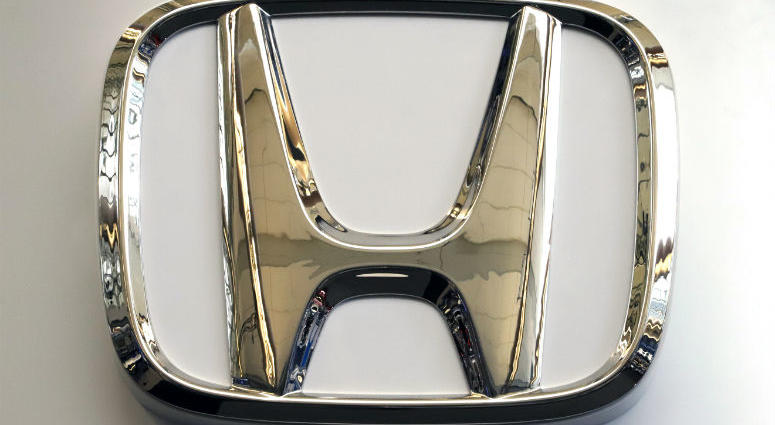 In this Feb. 14, 2019, photo, this photo shows the Honda logo on a sign at the 2019 Pittsburgh International Auto Show in Pittsburgh. In this Feb. 14, 2019, photo, this photo shows the Honda logo on a sign at the 2019 Pittsburgh International Auto Show in Pittsburgh.