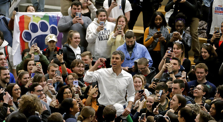 Democratic presidential candidate Beto O'Rourke, center, thanks students as he leaves the The Hub Robison Center on the Penn State campus in State College, Pa., Tuesday, March 19, 2019. Beto O'Rourke