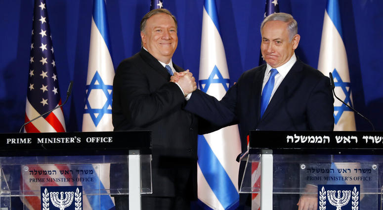 U.S. Secretary of State Mike Pompeo, left, shakes hands with Israeli Prime Minister Benjamin Netanyahu, during their visit to Netanyahu's official residence in Jerusalem, Thursday March 21, 2019. U.S. Secretary of State Mike Pompeo, left, shakes hands with Israeli Prime Minister Benjamin Netanyahu.