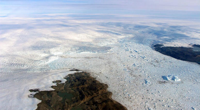 This 2016 photo provided by NASA shows patches of bare land at the Jakobshavn glacier in Greenland. The major Greenland glacier that was one of the fastest shrinking ice and snow masses on Earth is growing again, a new NASA study finds. The major Greenland glacier that was one of the fastest shrinking ice and snow masses on Earth is growing again, a new NASA study finds.