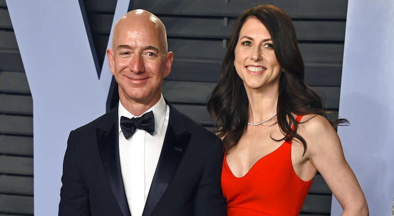 In this March 4, 2018 file photo, Jeff Bezos and wife MacKenzie Bezos arrive at the Vanity Fair Oscar Party in Beverly Hills, Calif. Jeff Bezos and wife MacKenzie Bezos